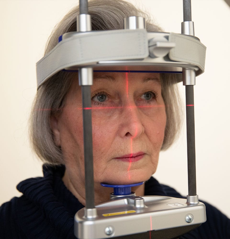 implant patient undergoing 3D scanning for dental treatment